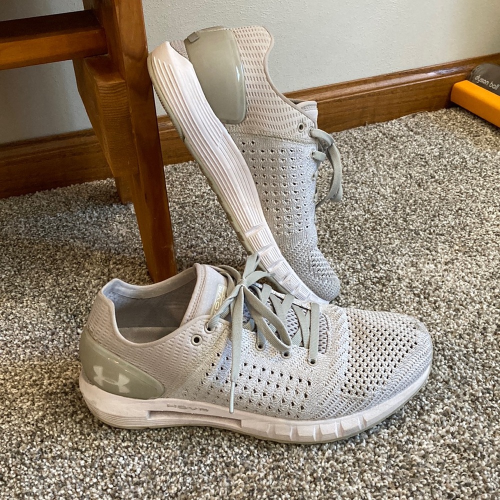Gray pair of under armor sneakers